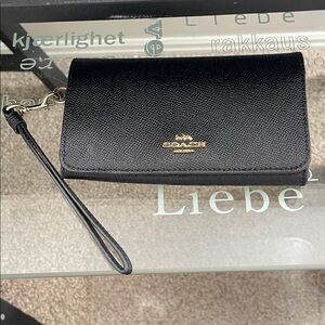 Coach Black Pebbled Leather Wristlet with Gold Accents
